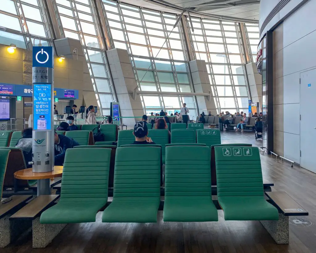 Green seats at an airport